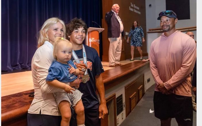 Tiger Woods and his former spouse, Elin Nordegren, rejoice as their 15-year-old son, Charlie, is awarded a golf championship ring.