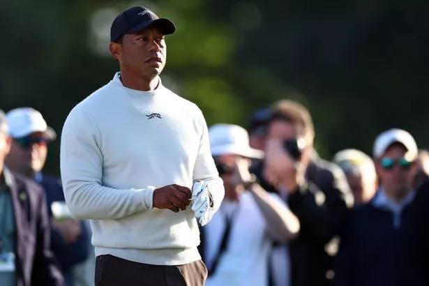 Tiger Woods breaks Masters routine for the first time in years, raising security concerns among guards.