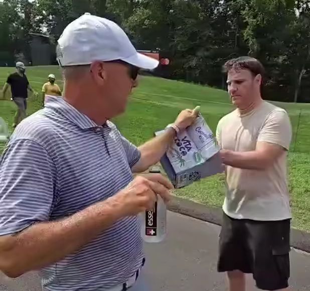 Scottie Scheffler’s Dad Wins Hearts by Handing Out Water to Fans at the Travelers Championship