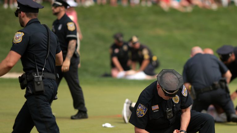 Watch: Protesters storm the 18th green at Travelers Championship