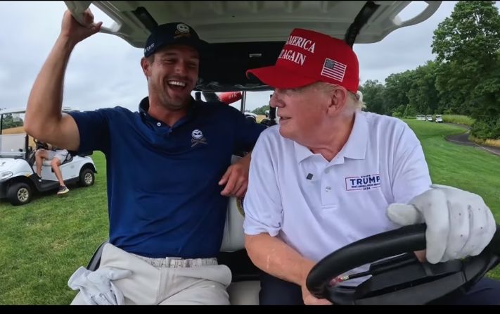 Donald Trump turns DJ as he blasts unusual song choice from his presidential golf cart and reveals his favorite singer in Bryson DeChambeau YouTube video