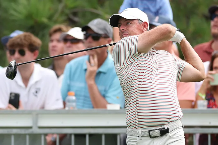 “Rory McIlroy’s Epic Meltdown: Watch Him Fume and Fish Out His Club from the Water!”