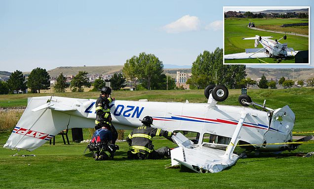 Horrific images show plane that crash-landed UPSIDE-DOWN on Colorado golf course